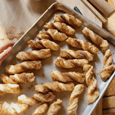 Featured image: Easy puff pastry cinnamon twists baked golden and dusted with sugar
