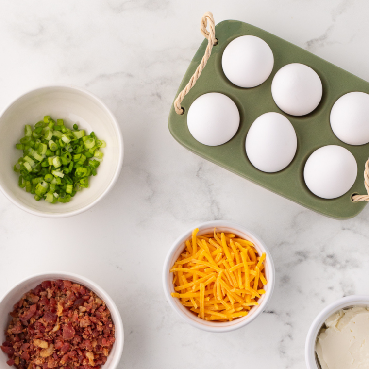 Ingredients needed for Easy Texas Roadhouse Deviled Eggs on kitchen table.