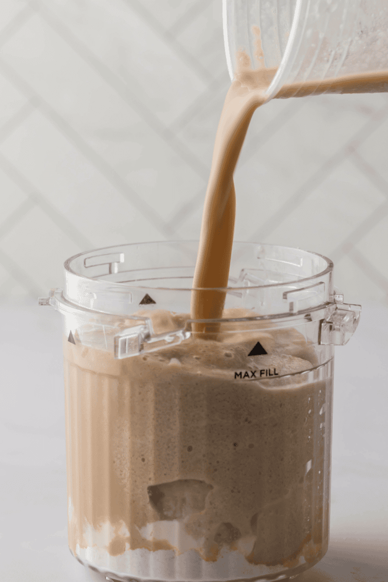 Whisking White Chocolate Mocha Frappuccino&reg; and pudding mix in a bowl until smooth.