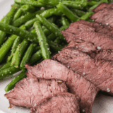 Best 3-Ingredient Steak Marinade in glass bowl ready for grilled steak