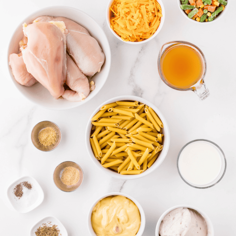 Ingredients needed for Cheesecake Factory Chicken and Biscuits Recipe on kitchen table.
