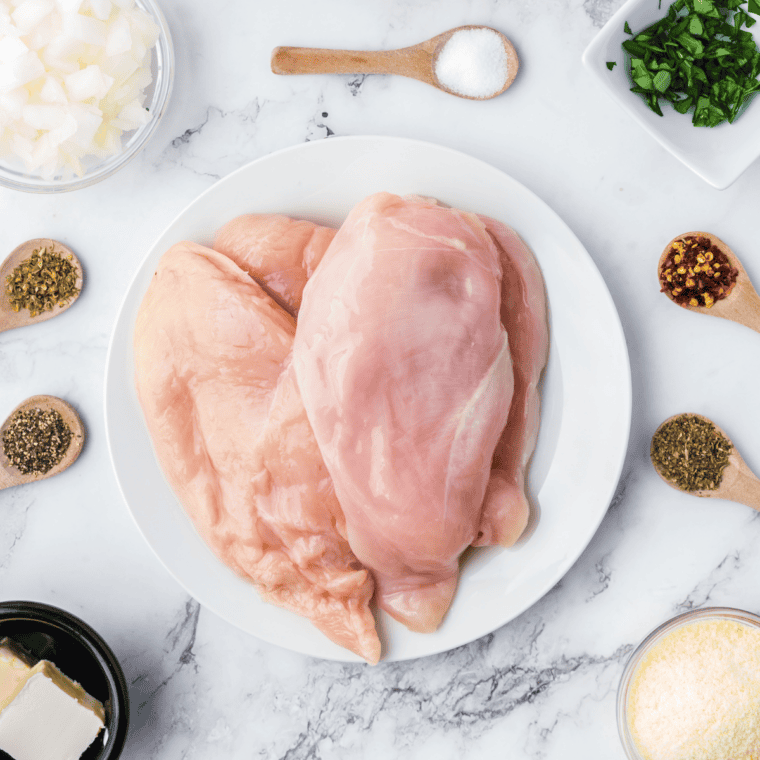 Boneless skinless chicken breasts seasoned with salt, black pepper, garlic, and onion powder.