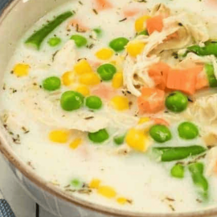 Freshly baked biscuits paired with creamy chicken ready to serve.