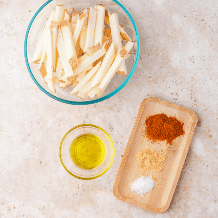 Ingredients needed for Copycat Kinder's Sweet Heat Seasoning Recipe on kitchen table.