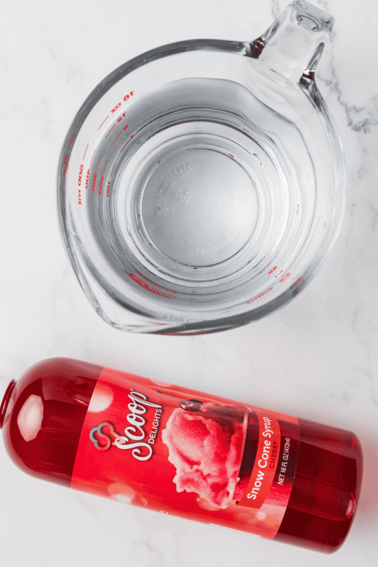 Ingredients needed for Easy Ninja Creami Cherry Italian Ice on kitchen table.