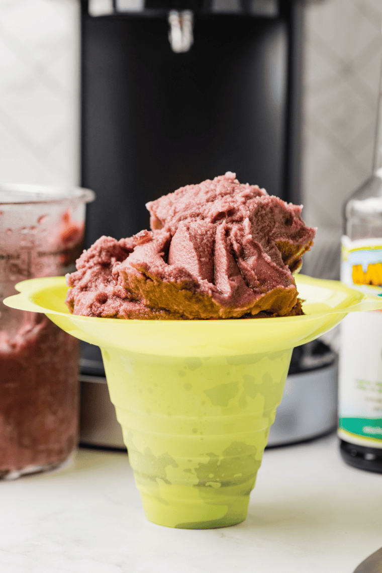 Bright purple grape Italian ice served in a bowl, made with the Ninja Creami