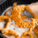 These Long John Silver’s Onion Rings are perfectly crispy on the outside with tender, sweet onions inside. This easy copycat recipe gives you that light, golden restaurant-style crunch right at home.