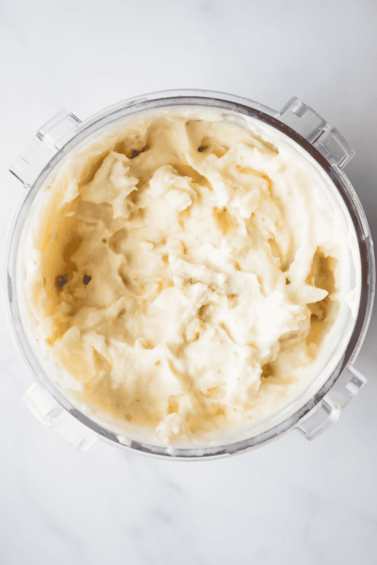 Adding toasted coconut and chopped nuts using Ninja Creami mix-in function.