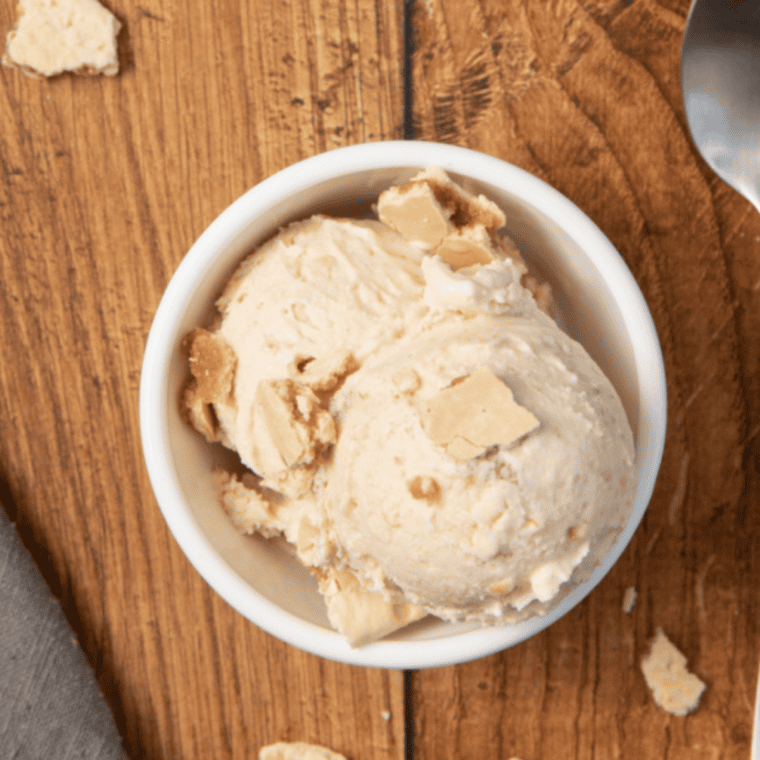Creamy almond gelato made in the Ninja Creami, served in a bowl