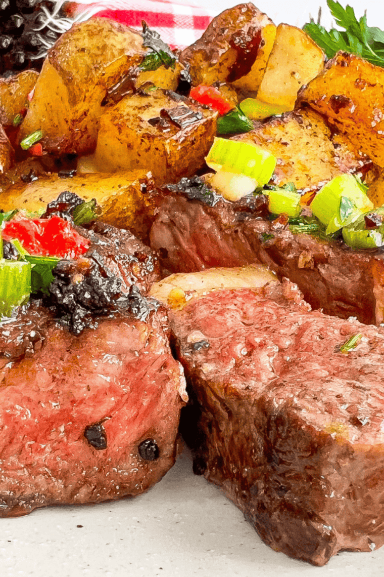 Jar of homemade Slap Ya Mama seasoning on wooden counter