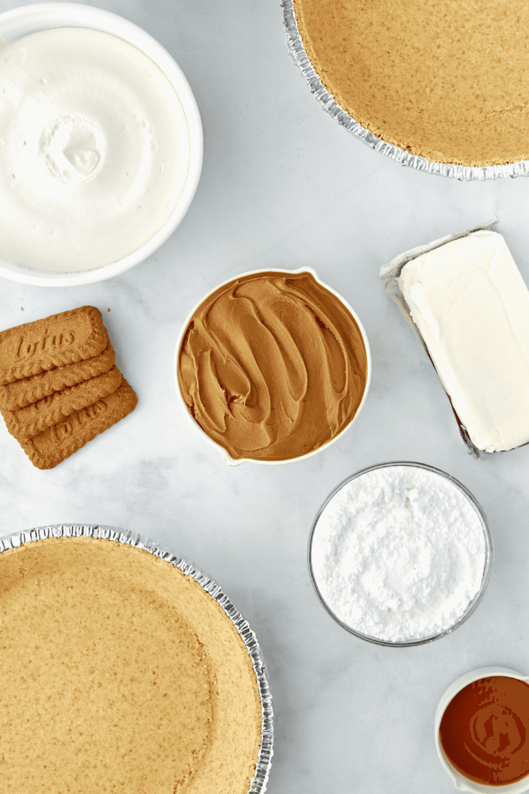 Ingredients needed for 3-Ingredient No-Bake Cheesecake on kitchen table.