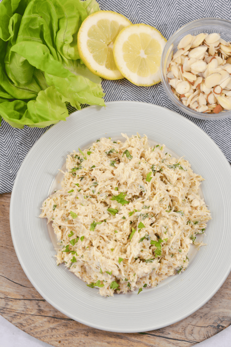 Creamy copycat Chicken Salad Chick Classic Carol chicken salad served in a bowl with shredded chicken and mayonnaise.
