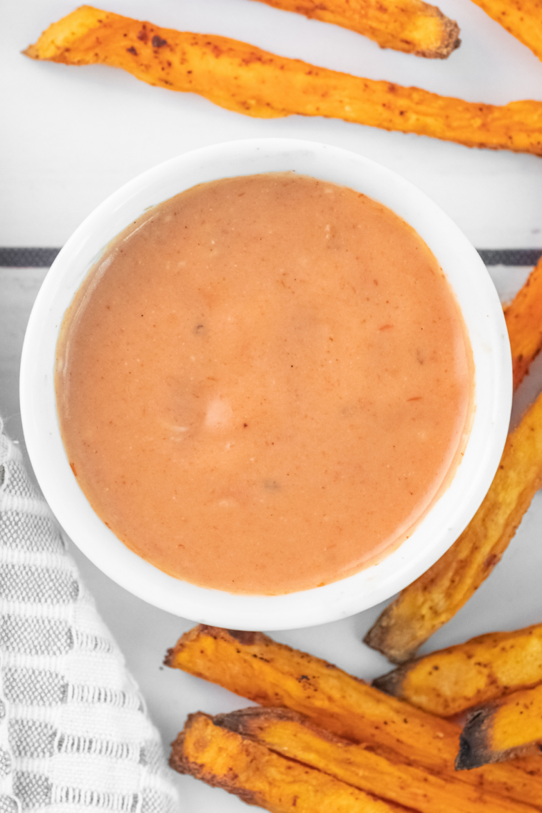 spoon dipping into creamy burger sauce homemade copycat recipe