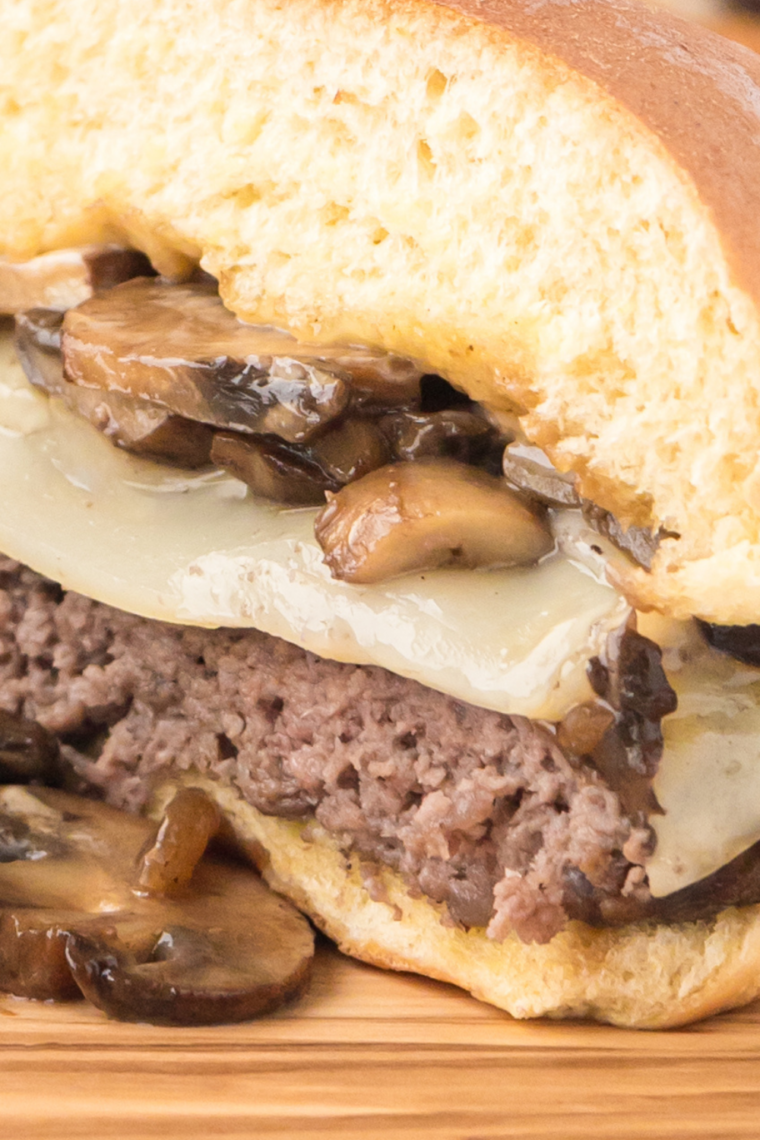 spoonful of creamy mushroom sauce dripping rich homemade gravy style