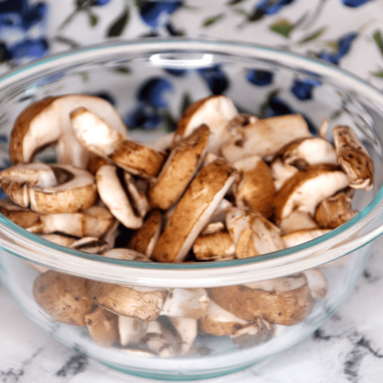 Sautéing sliced mushrooms in butter and oil until deeply browned and flavorful