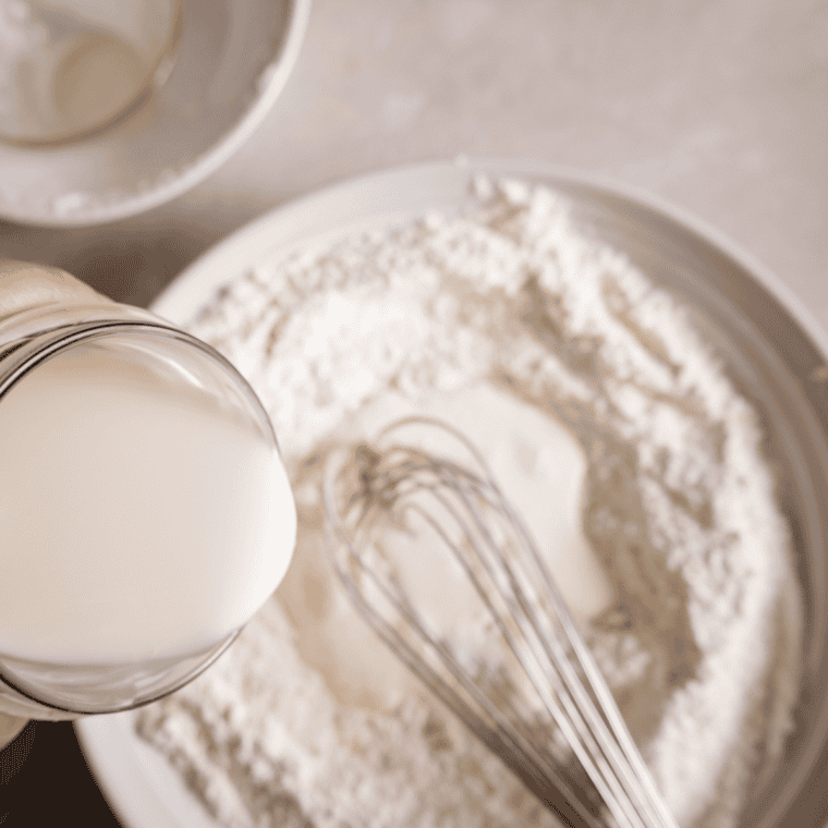 Whisking flour sugar baking powder salt dry mix