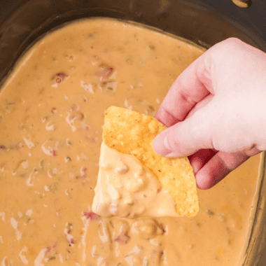 If you need a party dip that disappears faster than you can say &ldquo;grab a chip,&rdquo; this is it. This crock pot cream cheese taco dip is ridiculously creamy, loaded with bold taco flavor, and takes almost no effort to throw together.