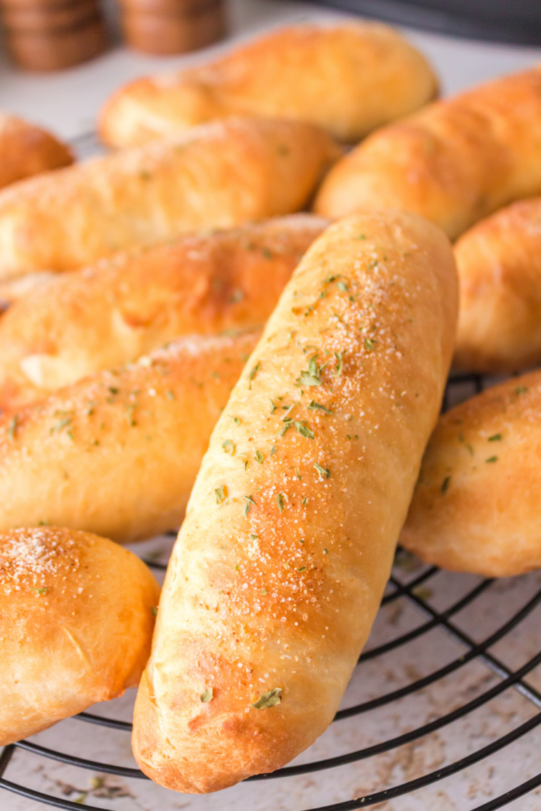 Homemade Fazoli&rsquo;s copycat breadsticks brushed with garlic butter, baked until soft, fluffy, and golden brown.