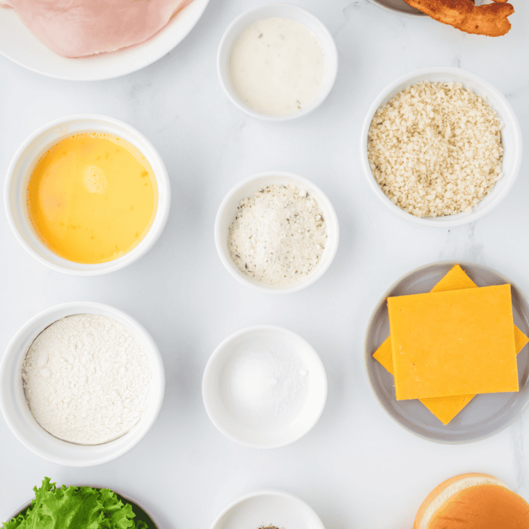 Ingredients needed for Easy First Watch Copycat Buttermilk Ranch Dressing Recipe on kitchen table.