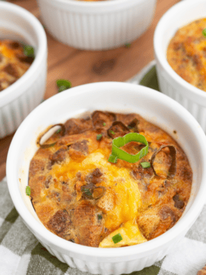 Easy Ina Garten breakfast strata baked golden with layers of bread, eggs, cheese, and savory mix-ins in a casserole dish.