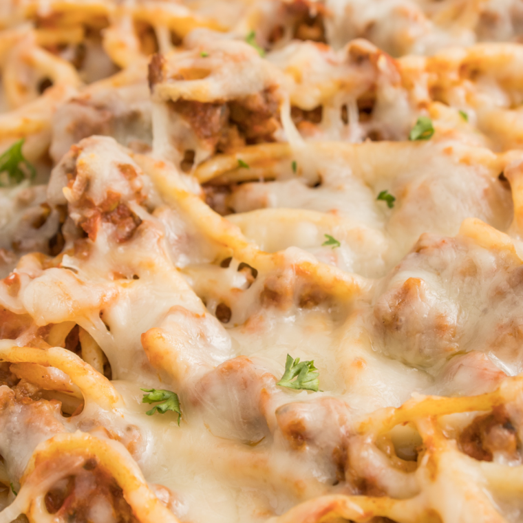 Baked spaghetti casserole inspired by Fazoli&rsquo;s with layers of spaghetti, meat sauce, and melted mozzarella cheese baked until golden and bubbly.
