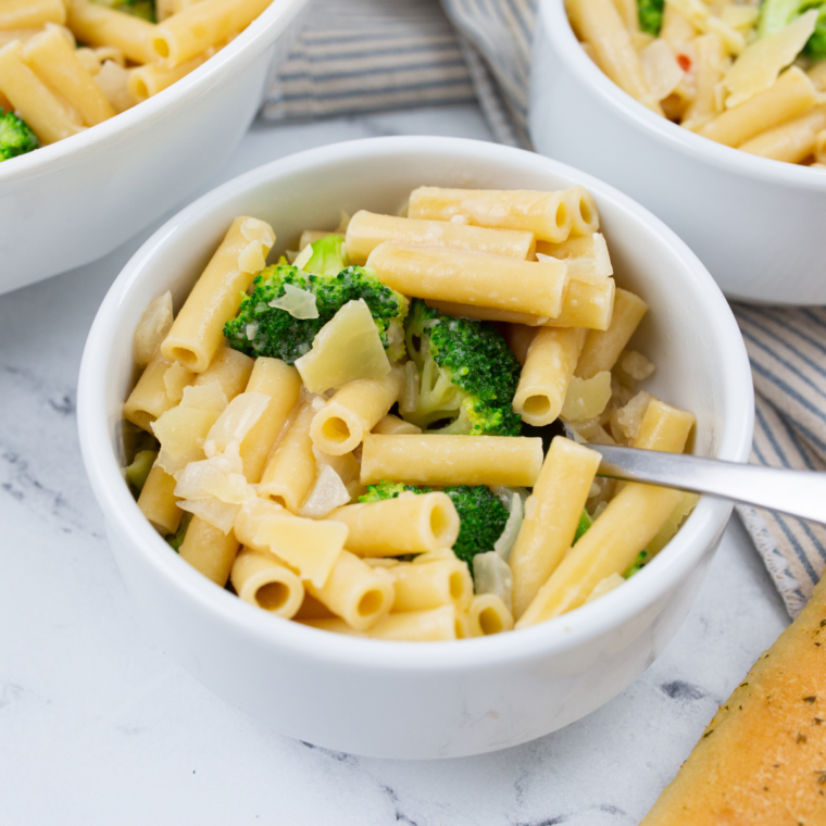 Creamy chicken broccoli penne pasta inspired by Fazoli&rsquo;s with tender chicken, roasted broccoli, and rich Alfredo sauce topped with melted cheese