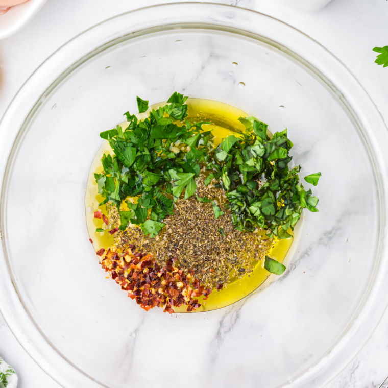 Searing seasoned Italian chicken in skillet until golden brown and fully cooked through