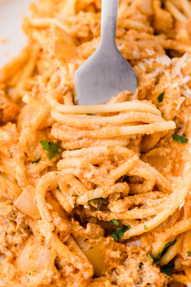 Homemade Fazoli&rsquo;s-style spaghetti sauce simmering in a pot with rich tomatoes, Italian herbs, and savory seasoning, served over pasta.
