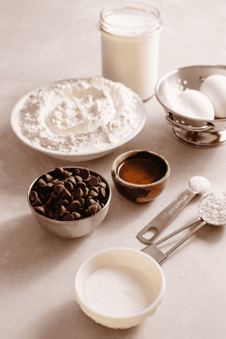 Ingredients needed for First Watch Chocolate Chip Pancake Recipe on kitchen table.