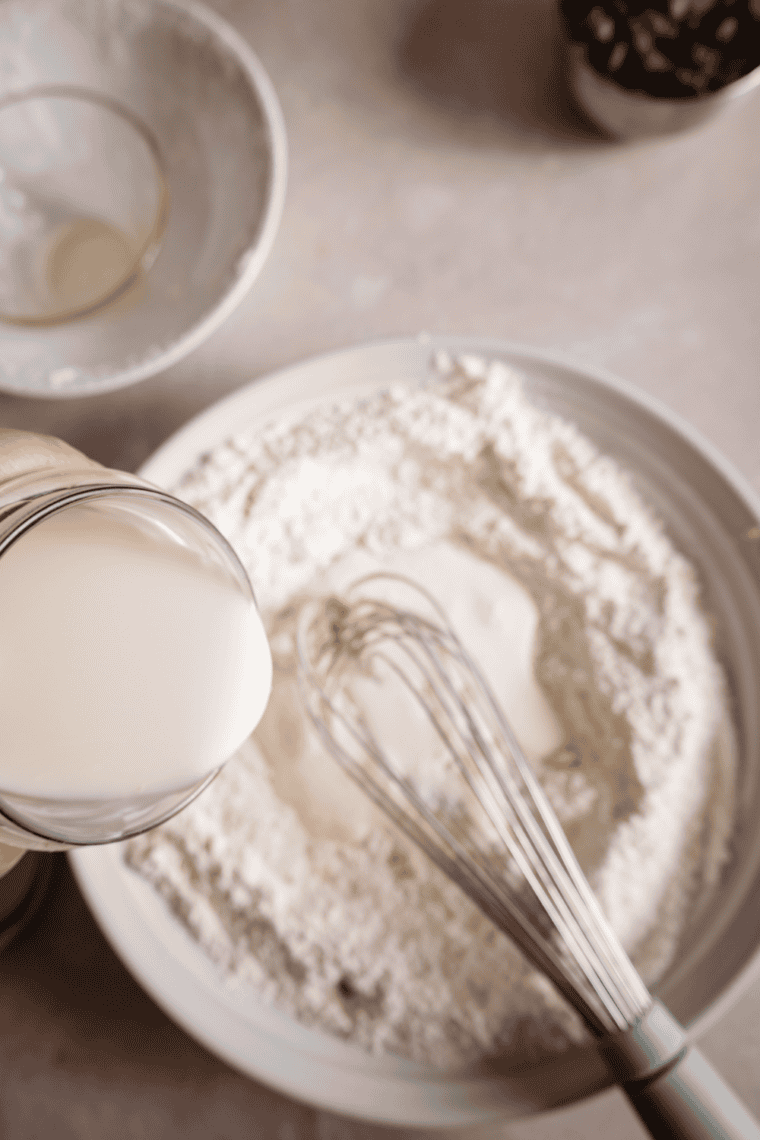 Mixing dry ingredients flour sugar baking powder salt bowl