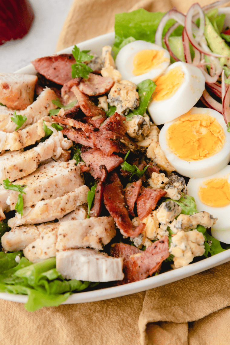 Finished Cobb salad served fresh in bowl ready to eat