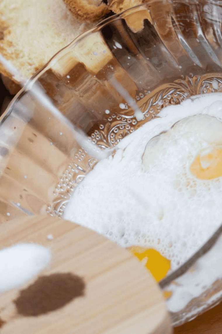 Whisking eggs, milk, orange juice, zest, vanilla, cinnamon