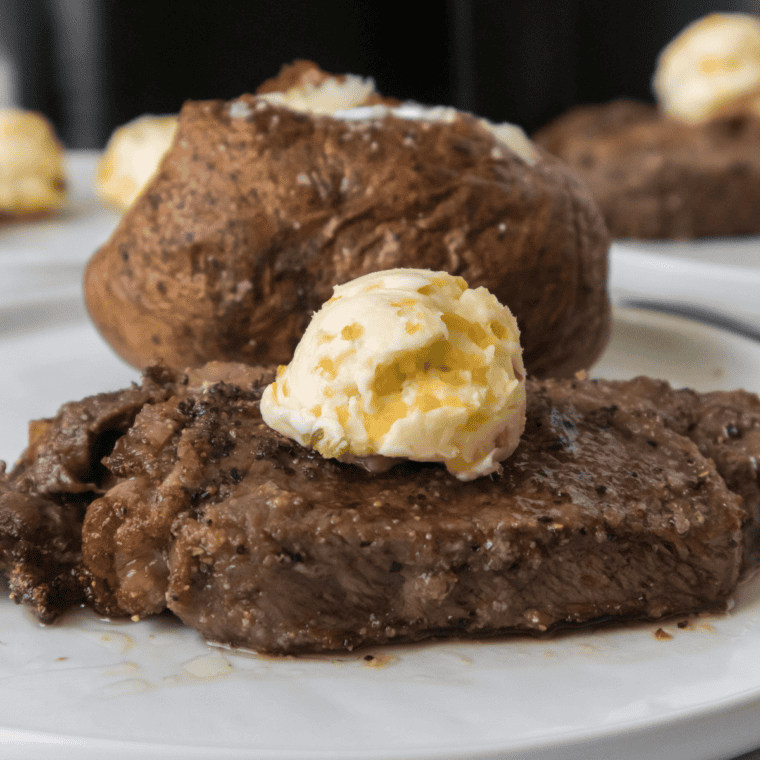 Creamy Gordon Ramsay peppercorn sauce in a skillet with cracked black pepper, butter, shallots, and cream creating a rich, silky steakhouse-style sauce.
