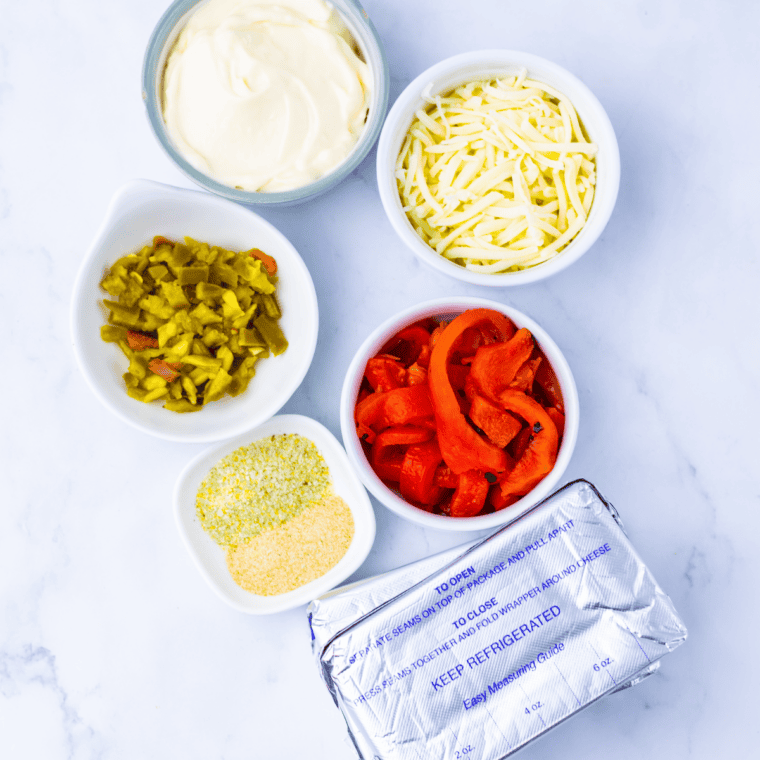 Ingredients needed for Ina Garten Veggie Dip Recipe on kitchen table.