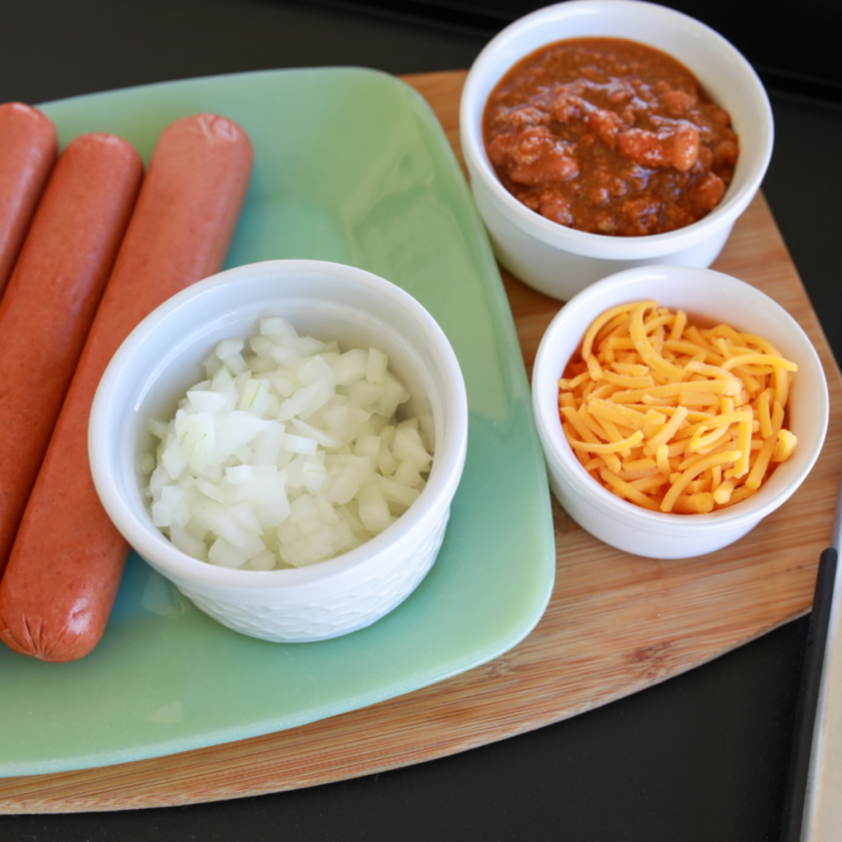 Ingredients needed for Instant Pot Hot Dogs  on kitchen table.