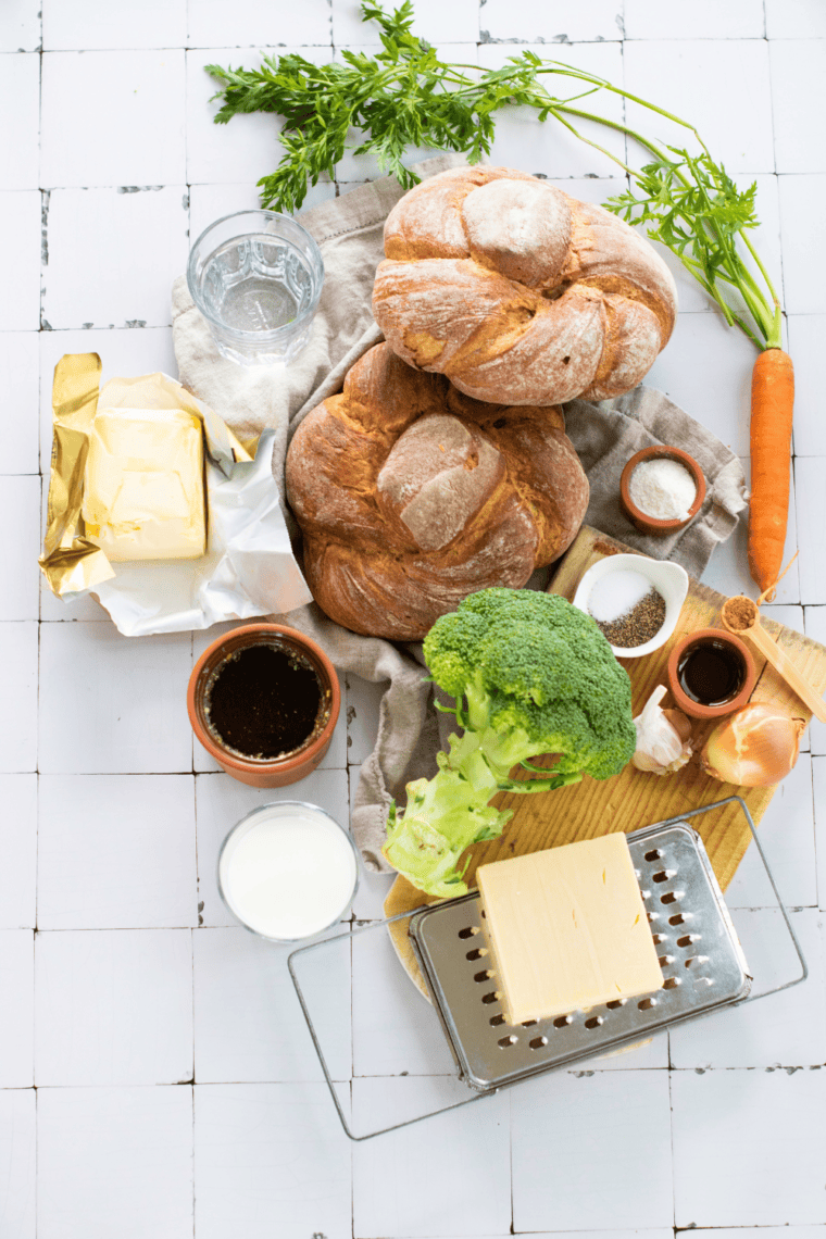 Ingredients needed for McAlister&rsquo;s Broccoli and Cheddar Soup Recipe on kitchen table.