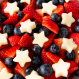 Star-spangled fruit salad with fresh fruit cut into star shapes for a patriotic 4th of July dish
