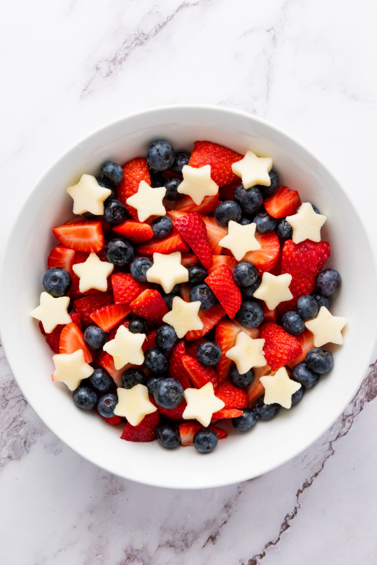 Star-spangled fruit salad chilling in the refrigerator before serving
