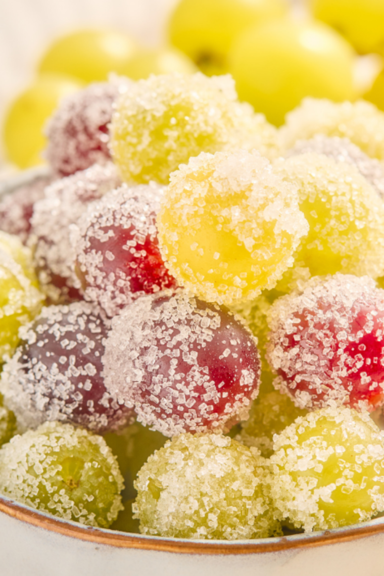 Close up of homemade sugar coated grapes with a frosted sugar finish ready to serve