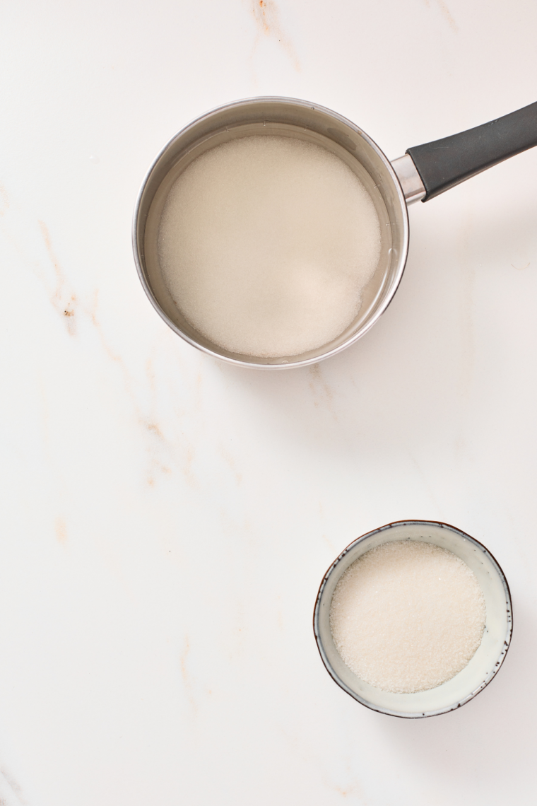 Simple syrup made by heating sugar and water in a saucepan until dissolved and clear