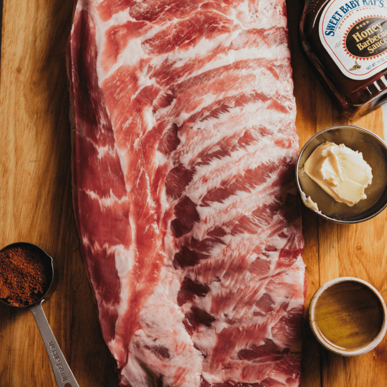 Ingredients needed for Air Fryer Beef Ribs on kitchen table.