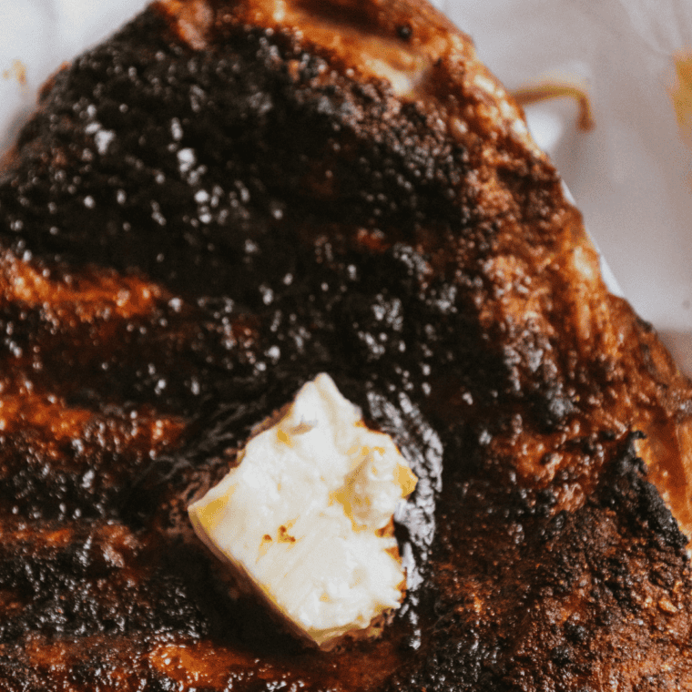 Close-up of air fryer beef ribs with a caramelized crust and juicy, tender meat.
