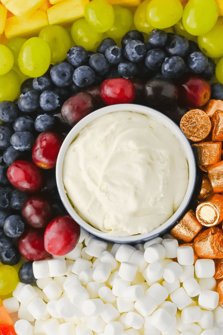 Copycat Jason's Deli fruit dip recipe with sour cream, brown sugar, and Grand Marnier ingredients styled on a marble countertop