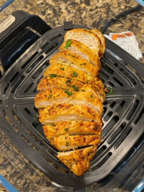 Crispy Ninja Crispi ginger-garlic chicken breasts served hot on a dinner plate
