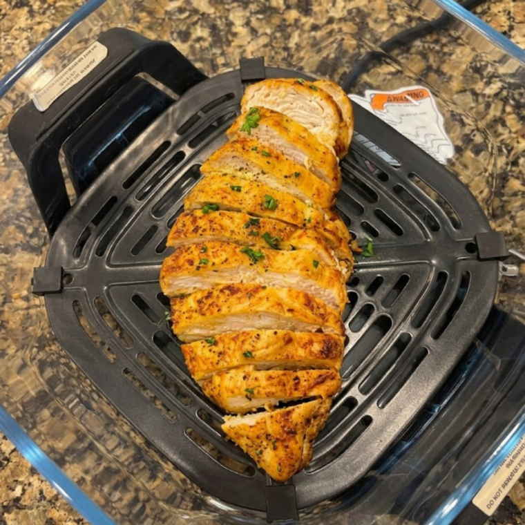 Crispy Ninja Crispi ginger-garlic chicken breasts served hot on a dinner plate