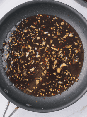 Homemade copycat McDonald's hot honey sauce served in a small dipping bowl.