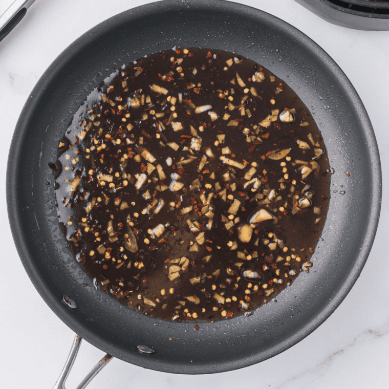 Homemade copycat McDonald's hot honey sauce served in a small dipping bowl.