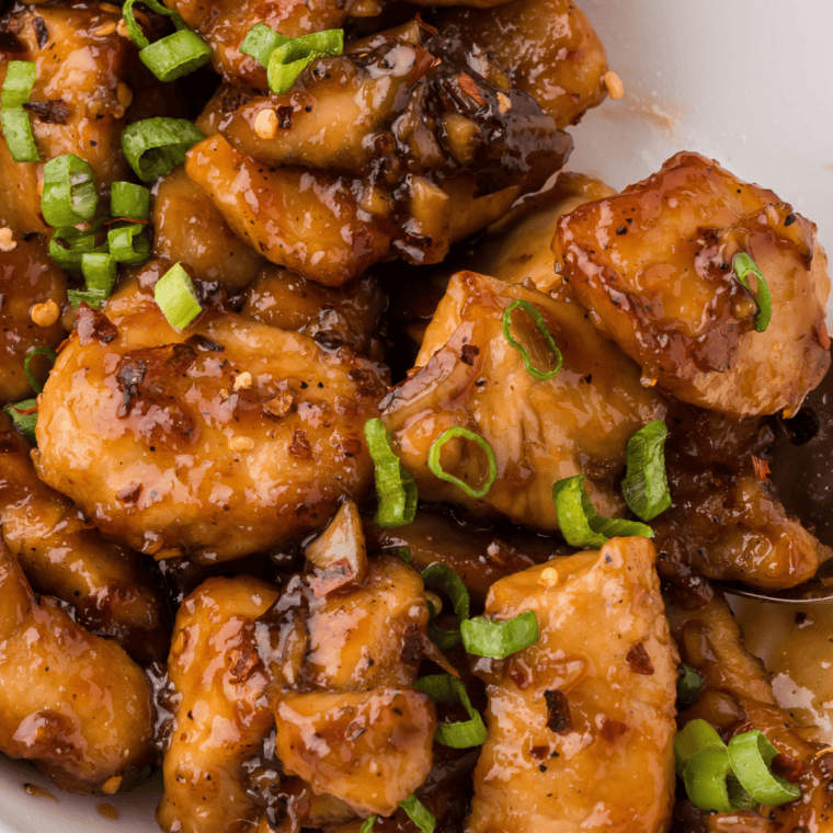 Finished honey garlic sauce stirred off heat with fresh garlic, ginger, and chili flakes added