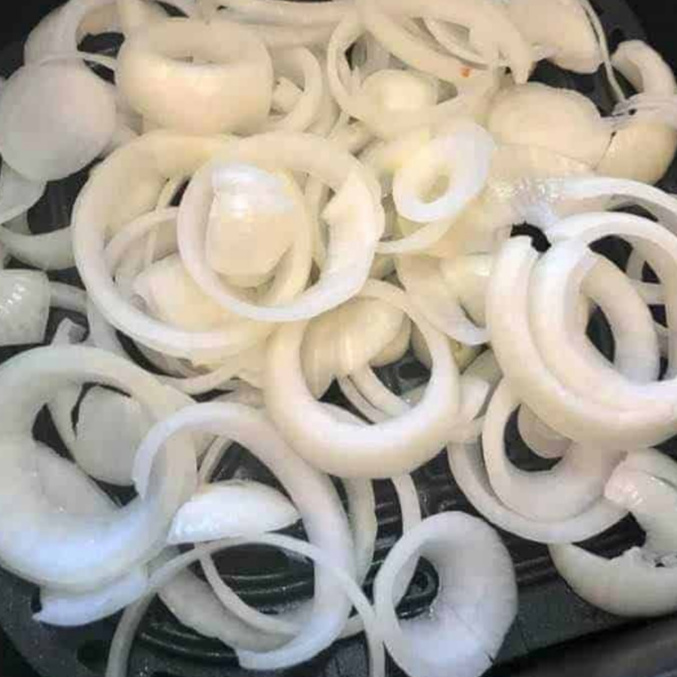 Rehydrating dried minced onion in warm water for McDonald&rsquo;s style burger flavor boost