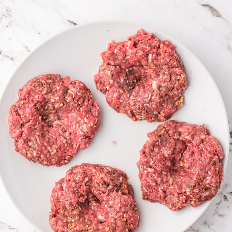 Loose ground beef balls formed for thin crispy fast food style burger patties